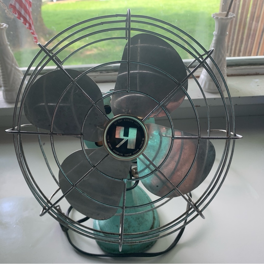 Vintage 1950’s Sears and Roebuck Electric Fan. Aqua cast iron base. Works well.